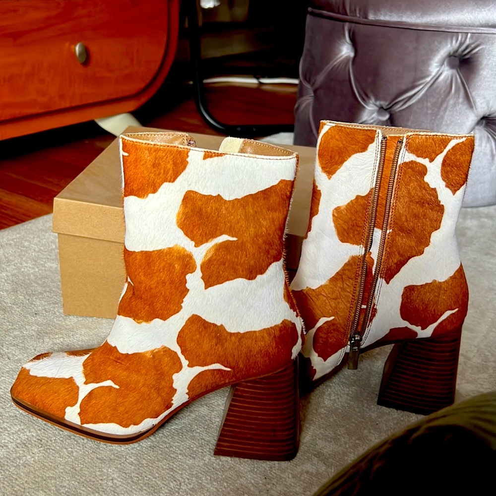 Nara Cow print boots